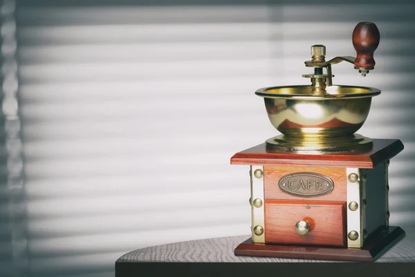 Coffee grinder on table — Stock Photo, Image