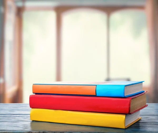 Stack of books on table — Stock Photo, Image