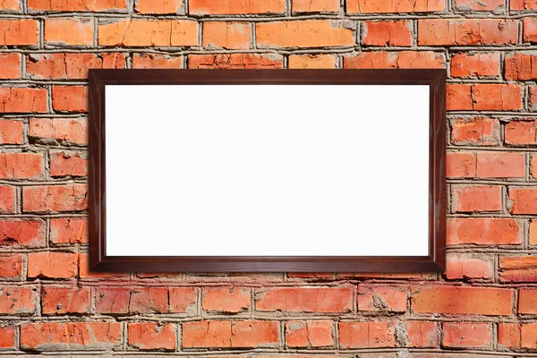 Пустая рамка на кирпичной стене — стоковое фото