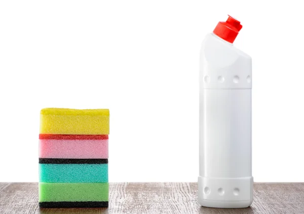 Garrafa de detergente e esponjas — Fotografia de Stock
