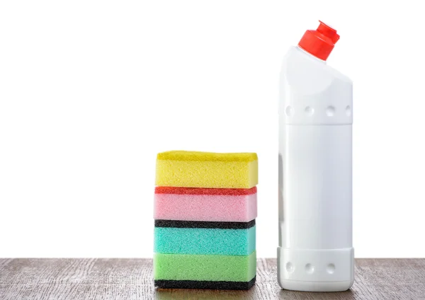 Detergent Bottle and sponges — Stock Photo, Image