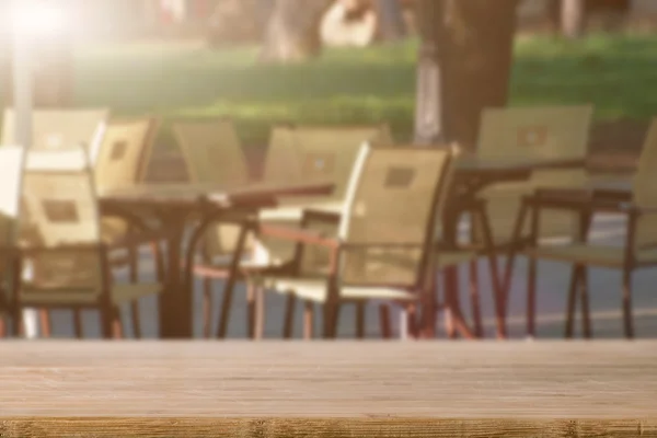 Summer cafe and wooden table — Stock Photo, Image