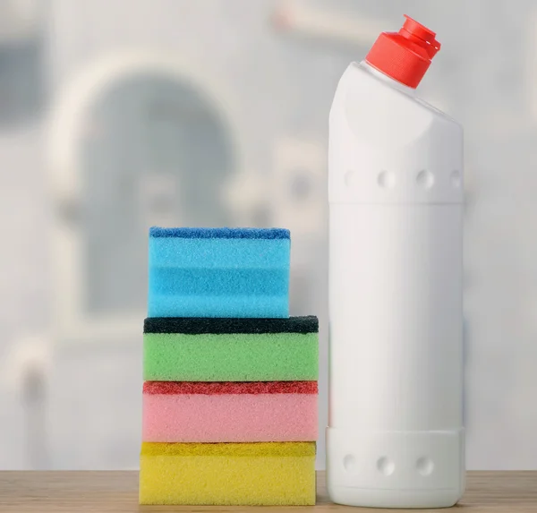 Detergent Bottle and sponges — Stock Photo, Image