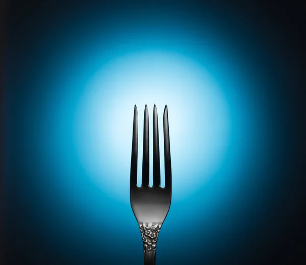 Fork on dark background — Stock Photo, Image