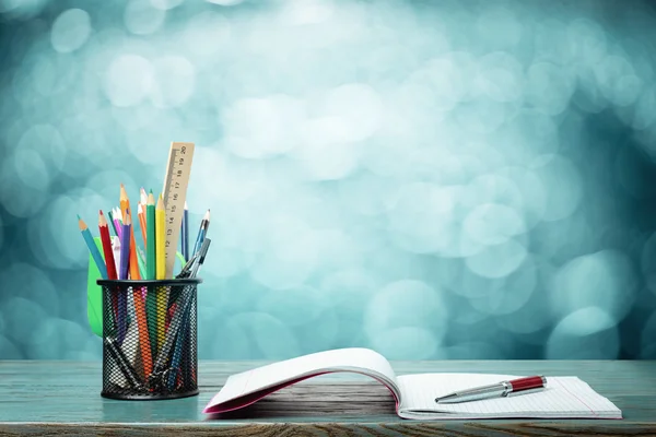 Copy-book, pen and pencils — Stock Photo, Image