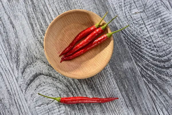 Chili peppers on table