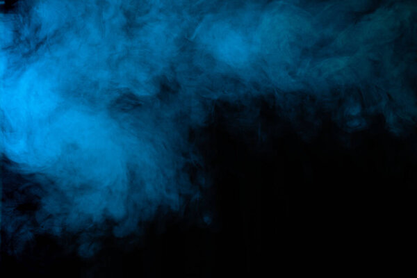Blue smoke on black background