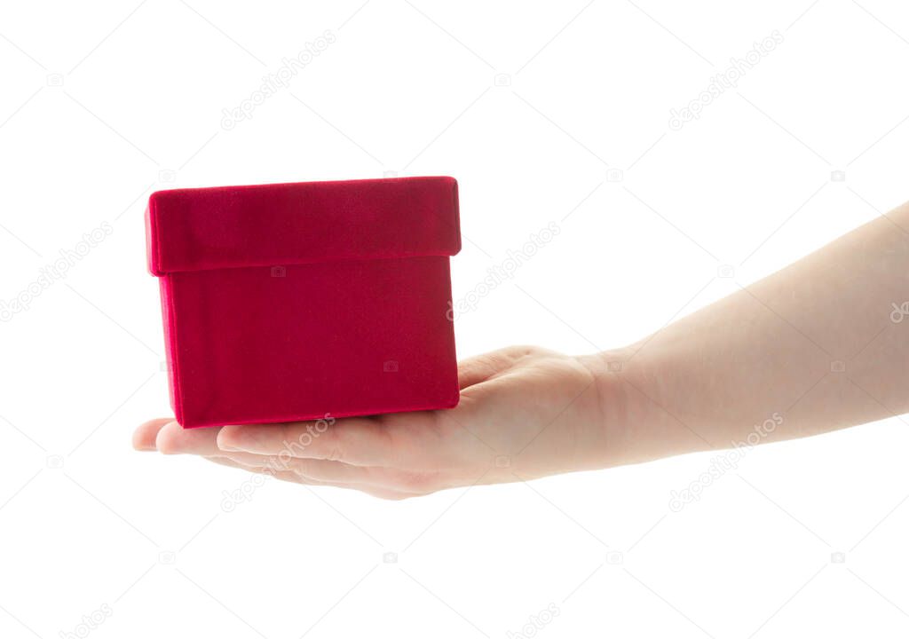 Red gift box in hand