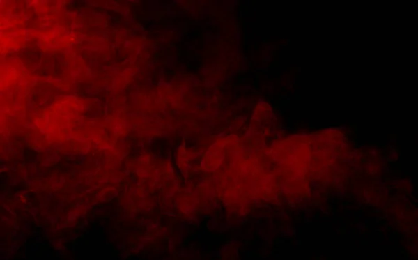 Siyah arkaplanda kırmızı duman