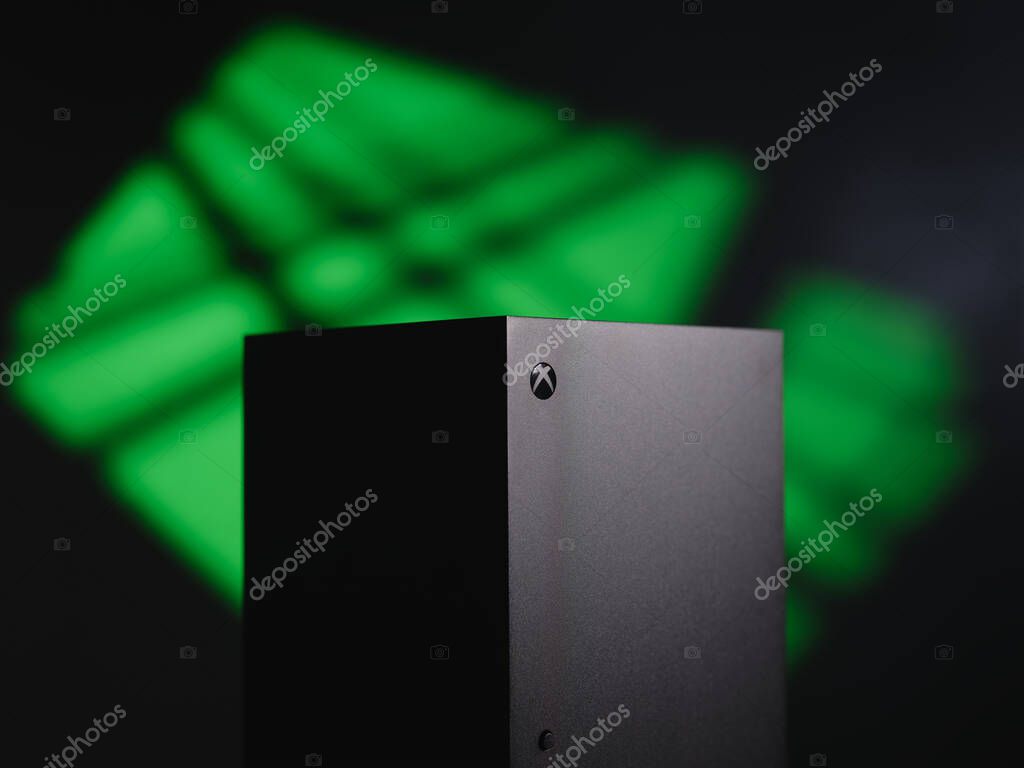 Close-up black xbox at green background