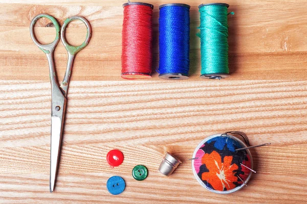 Sewing Kit on wooden table — Stock Photo, Image