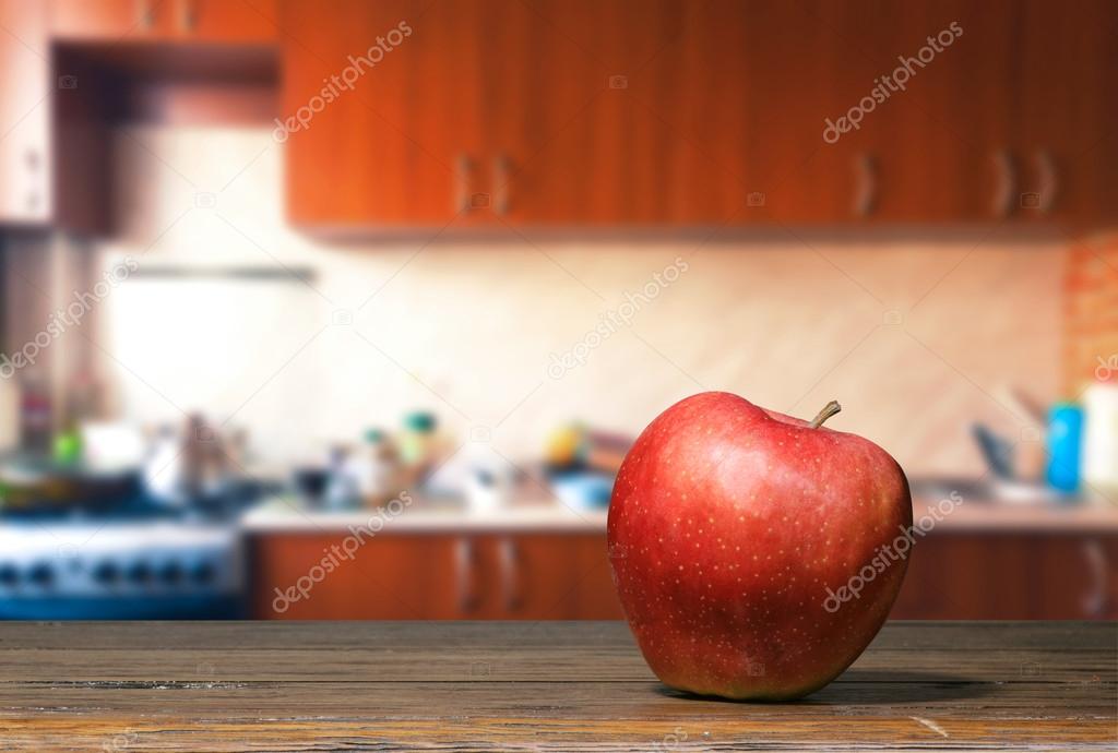 Apple on the kitchen table