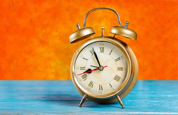 Alarm clock on table — Stock Photo, Image