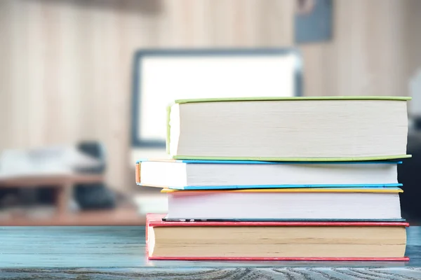 Books on office desk — Stock Photo, Image