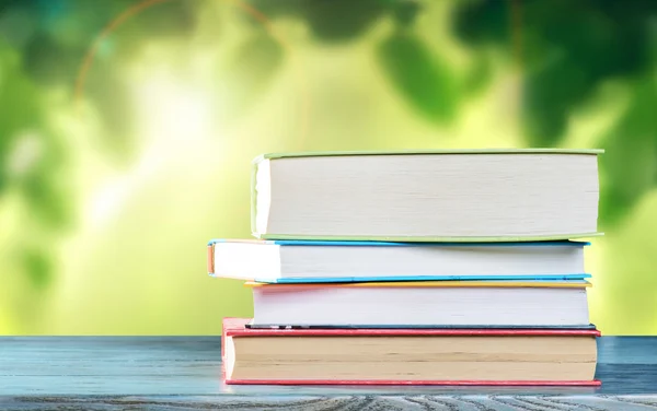 Books on wooden table — Stock Photo, Image