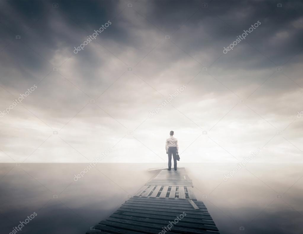 Man walk along  pier