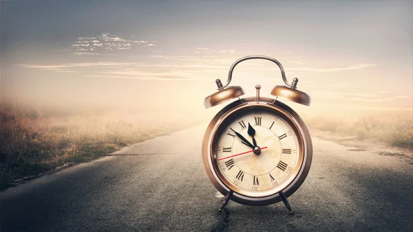 Alarm clock on road — Stock Photo, Image