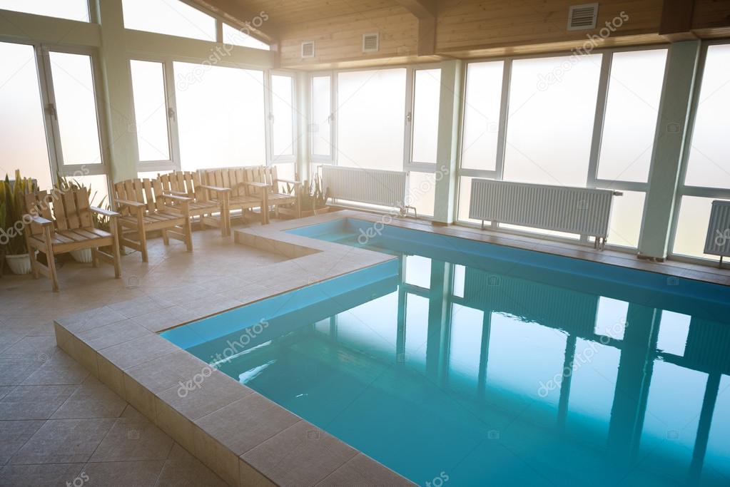 Piscina al coperto — foto stock © olegkrugllyak #87381172 Piscina al coperto