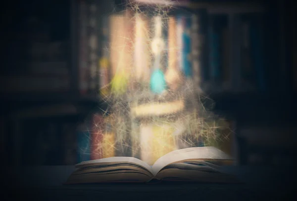 Magic book on table — Stock Photo, Image