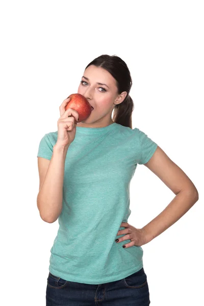 Girl eating an apple — Stock Photo, Image