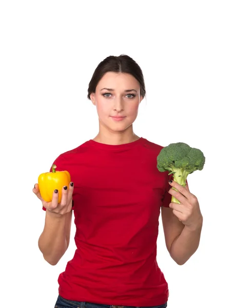 Mulher com brócolis e pimentas — Fotografia de Stock