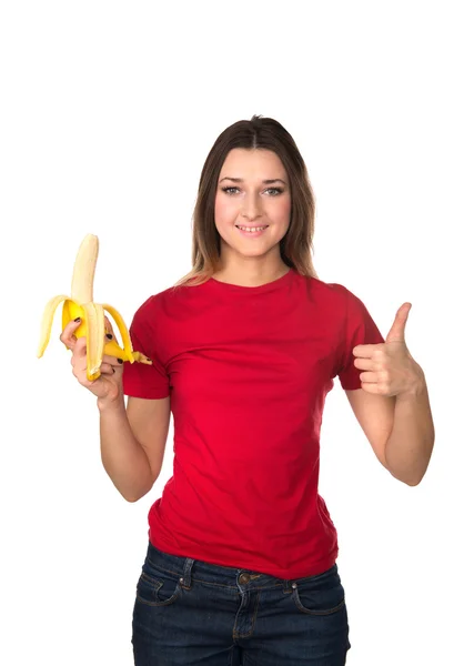 親指に現れるバナナを持つ女性 — ストック写真