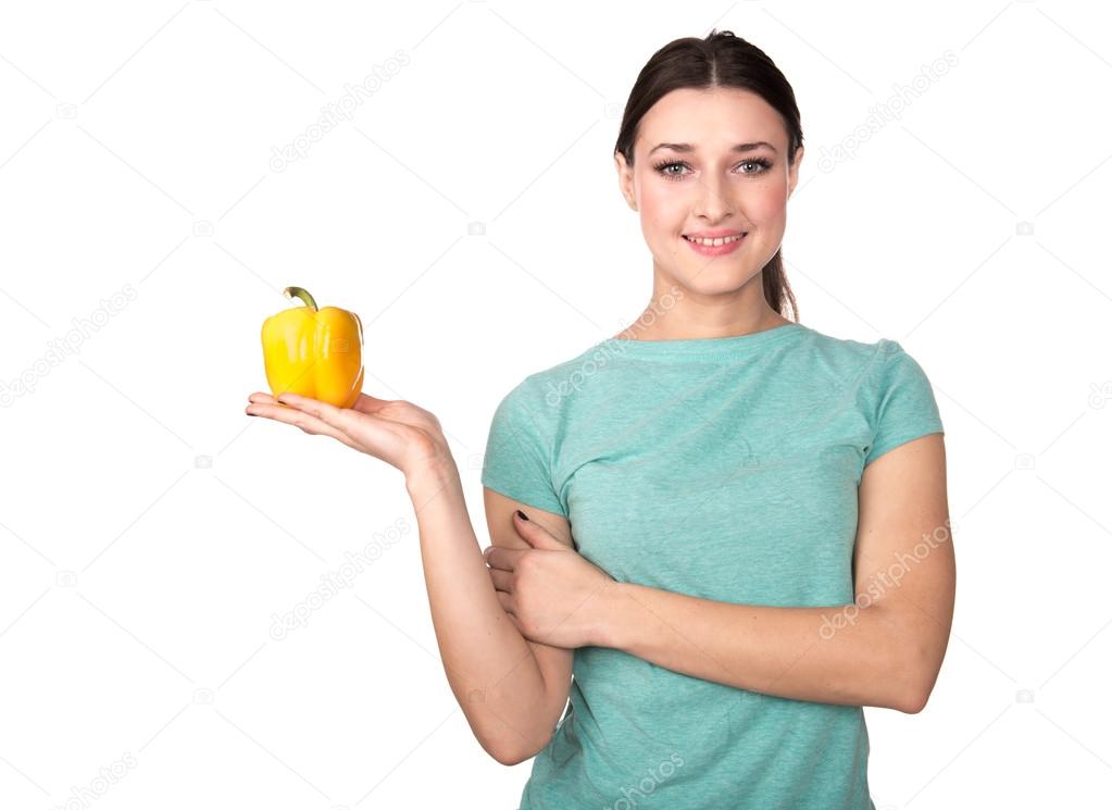 Woman holding pepper