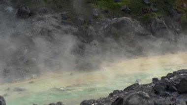 Mineral hot water in Hot Springs. Hot Spring on the top of mountain. Hot Spring water boiling.