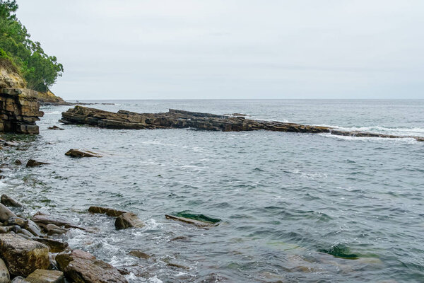 Waves hitting on the rock