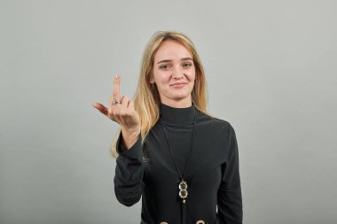 Middle finger, offensive gesture. Fuck you concept. Hand movement. Shag sign.