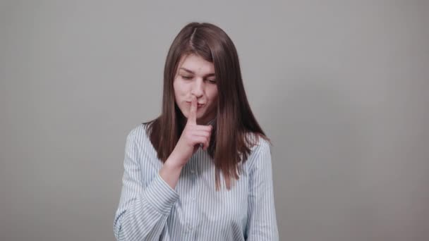 Index finger lips, silence gesture, shhh quiet, asks voicelessness forefinger — Stock Video