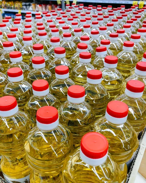 Sunflower oil warehouse close-up in a supermarket. Vegetarianism, healthy food