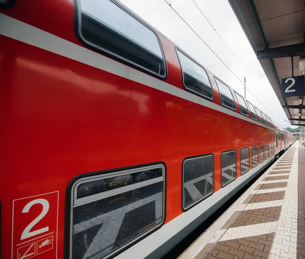 The long-distance train car is stationed at the station. Tourism.