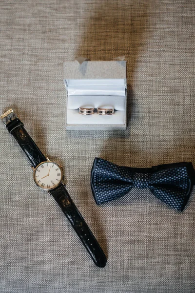 Stylish men\'s accessories close-up during the preparations for the wedding