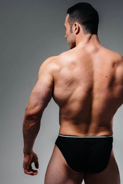 Young Athlete Bodybuilder Poses Studio Topless Back Sport — Stock Photo, Image