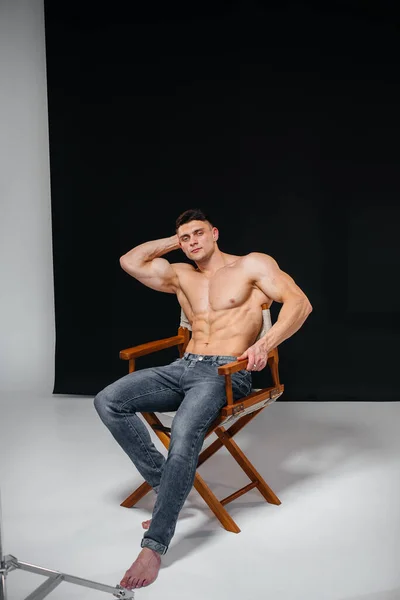 Young Sexy Athlete Perfect Abs Poses Studio Topless Jeans Background — Stock Photo, Image