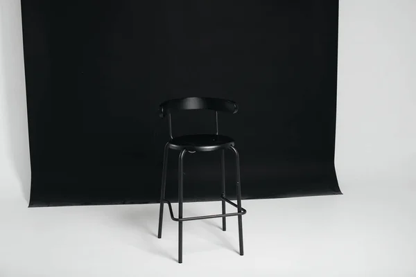 Stylish Black Chair Stands Black Background Studio Room Concept Vacancy — Stock Photo, Image