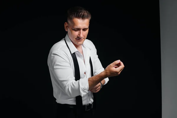 Stylish Young Man White Shirt Rolled Sleeves Poses Black Background — Stock Photo, Image