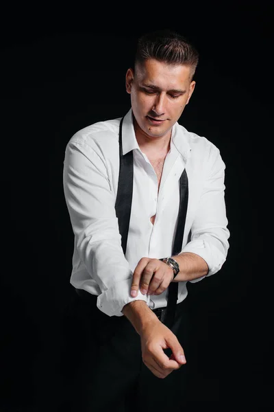 Stylish Young Man White Shirt Rolled Sleeves Poses Black Background — Stock Photo, Image