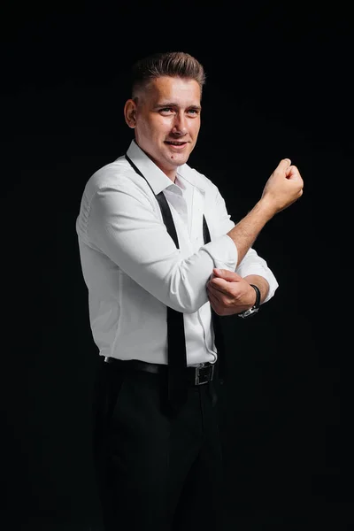 Stylish Young Man White Shirt Rolled Sleeves Poses Black Background — Stock Photo, Image