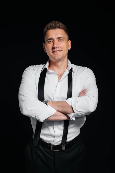 Stylish Young Man White Shirt Rolled Sleeves Poses Black Background — Stock Photo, Image