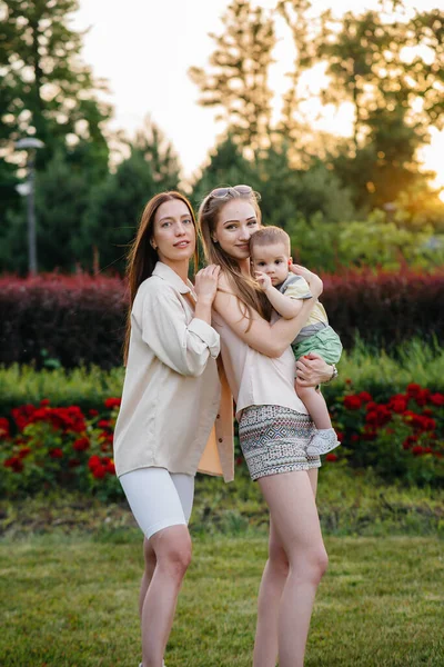 Young Homosexual Family Mothers Hugs Plays Park Young Son Sunset — Stock Photo, Image