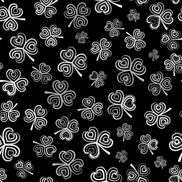 Vector seamless pattern with white clover on black background — Stock Vector