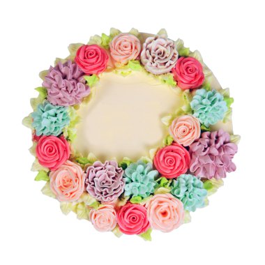 Üstten Görünüm krem kek dekore gül renkli.