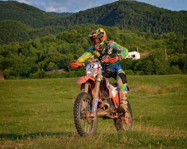 SIBIU, ROMANIA - JULY 16: Unknown competing in Red Bull ROMANIACS Hard Enduro Rally with a KTM 300  motorcycle. The hardest enduro rally in the world.