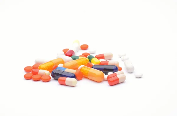 Pillerit eristetty valkoisella taustalla — kuvapankkivalokuva