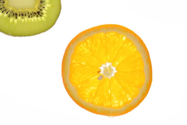 Slice of kiwi and oranges isolated on white background — Stock Photo, Image