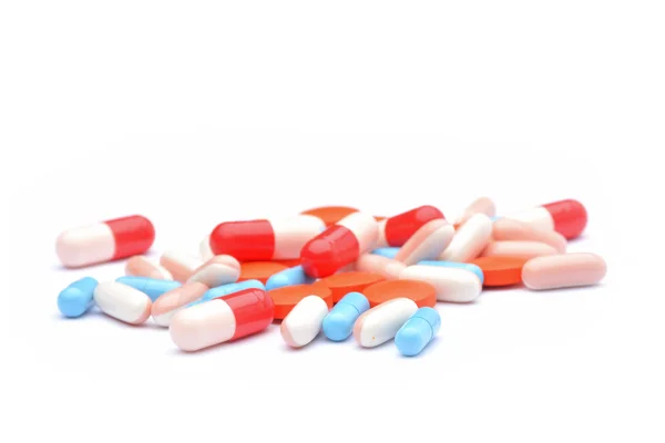 Pillerit eristetty valkoisella taustalla — kuvapankkivalokuva