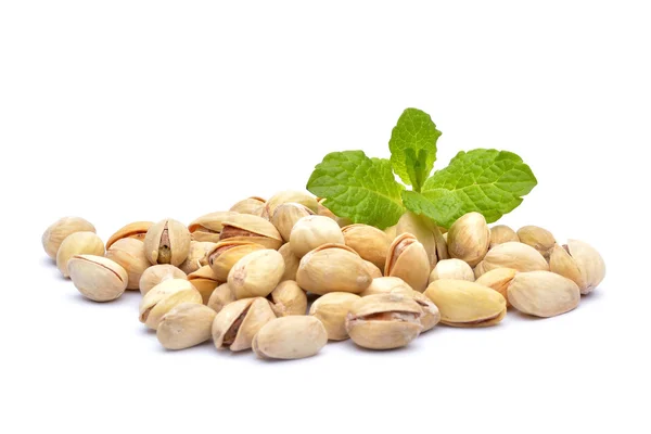 Heap of pistachios on the white background — Stock Photo, Image
