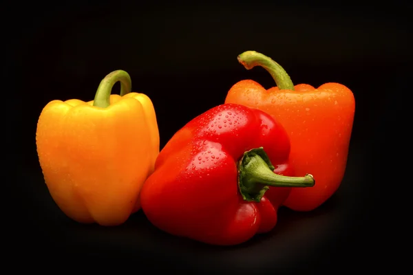 Sweet pepper on black background — Stock Photo, Image